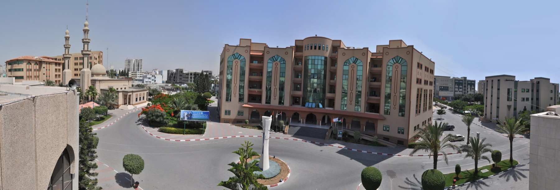Wide panorama of the Islamic University of Gaza campus buildings in 2012.